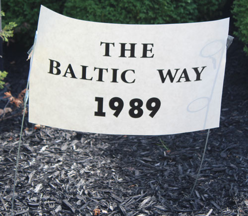 Baltic Way sign in Latvian Garden on One World Day